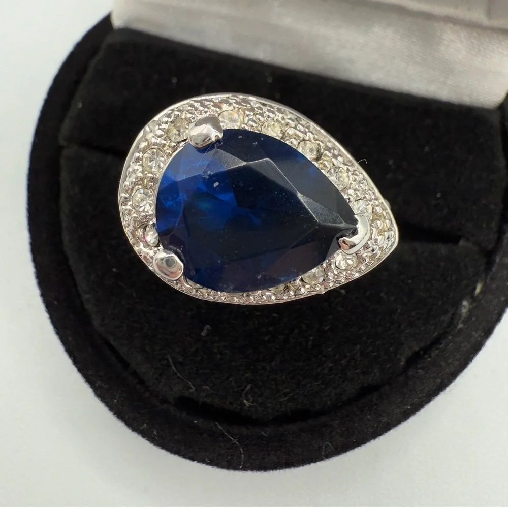 Beautiful Pear-Shaped Blue Glass Halo Ring with CZ Encrusted Base - Statement